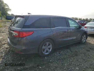 2019 Honda Odyssey EX with VIN 5FNRL6H58KB013889, listed as a Copart auction lot 57077025 with 126,467 mi miles and Salvage title. Bid and sale history available at DreamBid. Image 3.