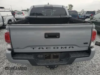 2020 Toyota Tacoma SR5 with VIN 3TMAZ5CNXLM121344, listed as a Copart auction lot 59393395 with 69,902 mi miles and Salvage title. Bid and sale history available at DreamBid. Image 6.