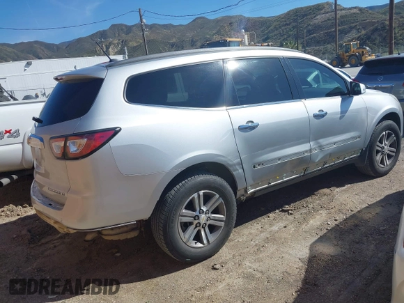 2015 Chevrolet Traverse LT with VIN 1GNKRGKD4FJ243697, listed as a IAAI auction lot 41809476 with 127,830 mi miles and . Bid and sale history available at DreamBid. Image 4.