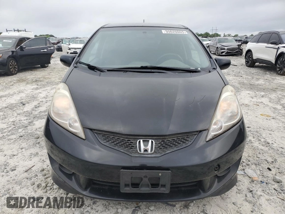 2009 Honda Fit Sport with VIN JHMGE88469S029833, listed as a Copart auction lot 55020865 with 202,335 mi miles and Clean Title. Bid and sale history available at carsss.com. Image 5.