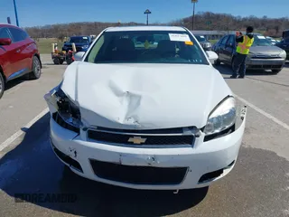 2014 Chevrolet Impala LTZ with VIN 2G1WC5E36E1182793, listed as a IAAI auction lot 41817899 with 171,776 mi miles and . Bid and sale history available at DreamBid. Image 12.