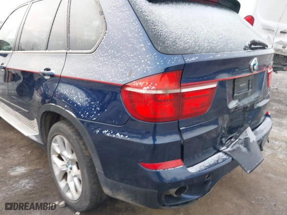 2011 BMW X5 35i with VIN 5UXZV4C54BL738262, listed as a IAAI auction lot 41633474 with 173,914 mi miles. Bid and sale history available at carsss.com. Image 20.