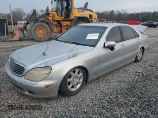 2002 Mercedes-Benz S-Class 4.3L with VIN WDBNG70J32A226516, listed as a IAAI auction lot 41783902 with 162,979 mi miles. Bid and sale history available at carsss.com. Image 2.