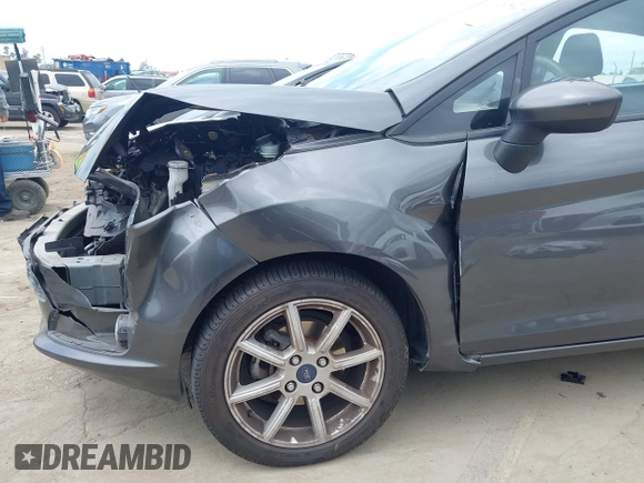2018 Ford Fiesta SE with VIN 3FADP4EJ7JM127256, listed as a IAAI auction lot 41938121 with 83,211 mi miles. Bid and sale history available at carsss.com. Image 18.