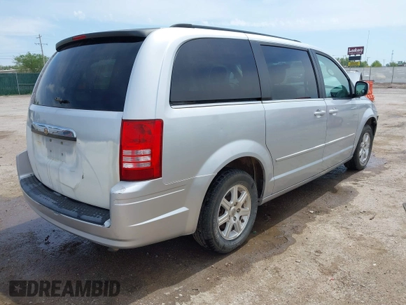 2008 Chrysler Town & Country Touring with VIN 2A8HR54P88R671360, listed as a IAAI auction lot 42104217 with 212,828 mi miles and . Bid and sale history available at DreamBid. Image 4.
