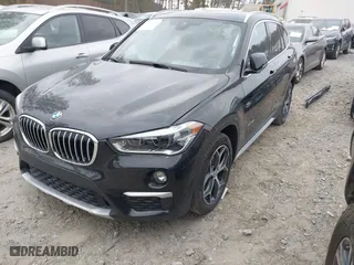 2018 BMW X1 xDrive28i with VIN WBXHT3C34J5K21576, listed as a IAAI auction lot 41822390 with 69,645 mi miles. Bid and sale history available at carsss.com. Image 17.
