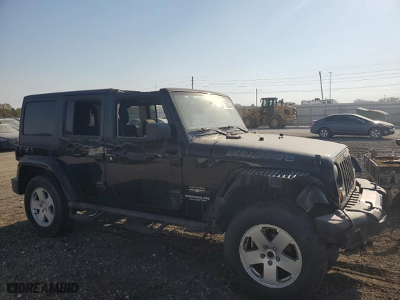 2011 Jeep Wrangler Unlimited Sahara with VIN 1J4BA5H10BL634002, listed as a Copart auction lot 75035234 with 139,182 mi miles and Salvage Title. Bid and sale history available at carsss.com. Image 4.