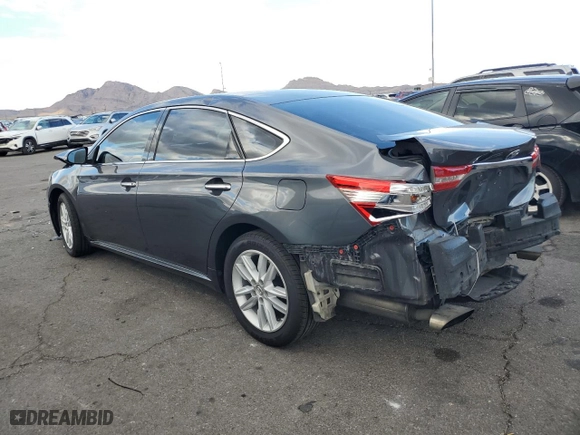 2013 Toyota Avalon XLE with VIN 4T1BK1EB2DU051187, listed as a Copart auction lot 48490855 with 128874 miles and Salvage Title. Bid and sale history available at carsss.com. Image 2.