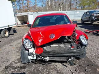 2017 Volkswagen Beetle 1.8T Fleet with VIN 3VWF17AT7HM618771, listed as a IAAI auction lot 41595088 with 67,943 mi miles. Bid and sale history available at carsss.com. Image 12.