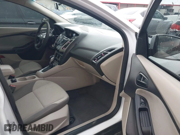 2012 Ford Focus SE z VIN 1FAHP3F29CL141649, wystawiony jako IAAI lot #40782821 z przebiegiem 266 683 mil mil oraz . Historia ofert i sprzedaży dostępna na DreamBid. Obrazek 5.