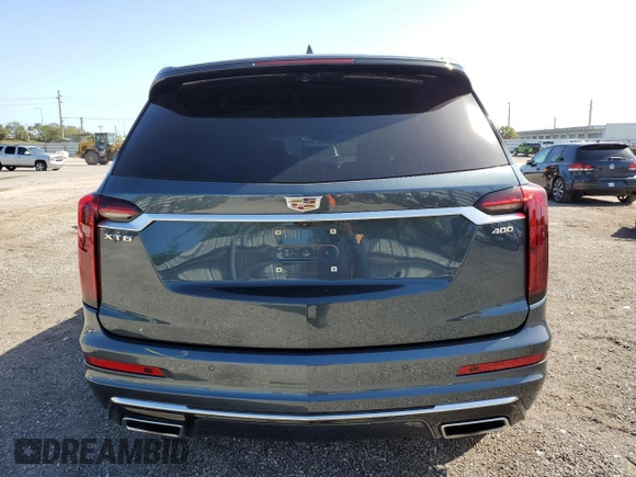 2021 Cadillac XT6 Luxury z VIN 1GYKPAR49MZ212522, wystawiony jako Copart lot #41449264 z przebiegiem 45 935 mil mil oraz . Historia ofert i sprzedaży dostępna na DreamBid. Obrazek 6.
