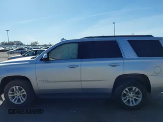 2018 Chevrolet Tahoe LT with VIN 1GNSKBKC3JR195215, listed as a IAAI auction lot 41847254 with 67,328 mi miles and . Bid and sale history available at DreamBid. Image 14.