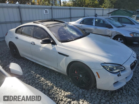 2017 BMW 6 Series 650i with VIN WBA6D4C55HD977701, listed as a Copart auction lot 75016784 with 109,245 mi miles and Salvage Title. Bid and sale history available at carsss.com. Image 4.