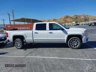 2014 GMC Sierra 1500 Denali z VIN 3GTU2WEJ2EG349289, wystawiony jako IAAI lot #41313698 z przebiegiem 190 441 mil mil oraz . Historia ofert i sprzedaży dostępna na DreamBid. Obrazek 13.