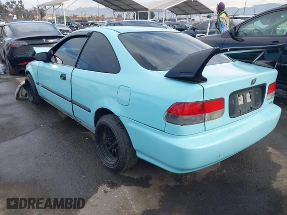 1998 Honda Civic HX with VIN 1HGEJ7127WL127977, listed as a IAAI auction lot 41230187 with 182,000 mi miles. Bid and sale history available at carsss.com. Image 3.