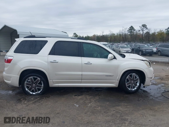 2011 GMC Acadia Denali with VIN 1GKKRTED1BJ399126, listed as a IAAI auction lot 41905415 with 163,357 mi miles and . Bid and sale history available at DreamBid. Image 13.