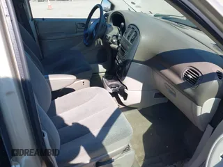 2005 Dodge Caravan SXT with VIN 2D8GP44L05R459369, listed as a IAAI auction lot 42638057 with 76,777 mi miles and . Bid and sale history available at DreamBid. Image 5.