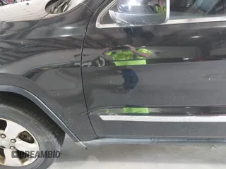 2012 Jeep Grand Cherokee Laredo with VIN 1C4RJFAT8CC182128, listed as a IAAI auction lot 40154044 with 239,601 mi miles. Bid and sale history available at carsss.com. Image 6.