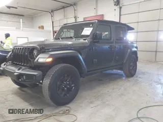 2021 Jeep Wrangler Unlimited Sport S with VIN 1C4HJXDN8MW744768, listed as a IAAI auction lot 41894327 with 47,826 mi miles and . Bid and sale history available at DreamBid. Image 2.