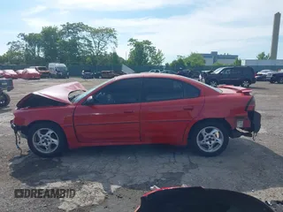 2004 Pontiac Grand Am GT z VIN 1G2NW52E94C107860, wystawiony jako IAAI lot #42241126 z przebiegiem 122 803 mil mil oraz . Historia ofert i sprzedaży dostępna na DreamBid. Obrazek 15.