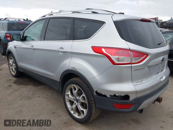 2013 Ford Escape Titanium с VIN 1FMCU9J91DUA13353, выставлен на аукционе IAAI как лот 42074045 с пробегом 108 452 миль миль и . История ставок и продаж доступна на DreamBid. Изображение 3.