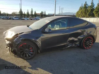 2024 Tesla Model Y Performance with VIN 7SAYGDEF0RF024576, listed as a Copart auction lot 78959684 with 7,440 mi miles and Salvage Title. Bid and sale history available at DreamBid. Image 1.