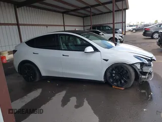 2023 Tesla Model Y Long Range with VIN 7SAYGAEE0PF787216, listed as a IAAI auction lot 41589954 with 17,985 mi miles and . Bid and sale history available at DreamBid. Image 14.