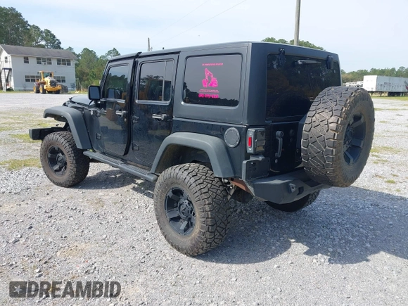 2012 Jeep Wrangler Unlimited Sport with VIN 1C4BJWDG2CL258264, listed as a IAAI auction lot 41880235 with 173,661 mi miles. Bid and sale history available at carsss.com. Image 3.