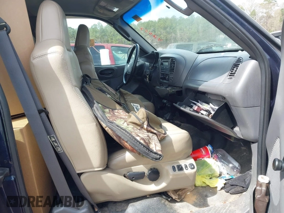 2003 Ford F-150 XL with VIN 1FTRX18L63NB59927, listed as a IAAI auction lot 41842559 with 1 mi miles. Bid and sale history available at carsss.com. Image 5.