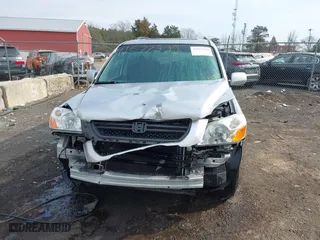 2005 Honda Pilot EX-L with NAVI with VIN 2HKYF18725H534538, listed as a IAAI auction lot 41677322 with 157,987 mi miles. Bid and sale history available at carsss.com. Image 12.