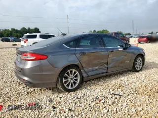 2017 Ford Fusion Hybrid SE with VIN 3FA6P0LU7HR318039, listed as a Copart auction lot 63575325 with 106,355 mi miles and Salvage title. Bid and sale history available at DreamBid. Image 3.