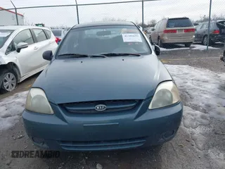 2003 Kia Rio with VIN KNADC125336231562, listed as a IAAI auction lot 41386659 with 87,965 mi miles. Bid and sale history available at carsss.com. Image 12.