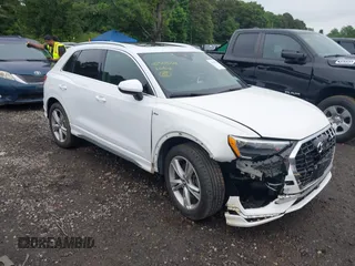 2020 Audi Q3 S line Premium with VIN WA1DECF30L1115390, listed as a IAAI auction lot 42503728 with 18,556 mi miles and . Bid and sale history available at DreamBid. Image 6.