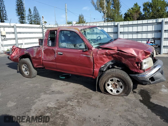 1999 Toyota Tacoma PreRunner with VIN 4TASN92NXXZ573027, listed as a Copart auction lot 48025455 with 111,854 mi miles and Salvage title. Bid and sale history available at DreamBid. Image 4.