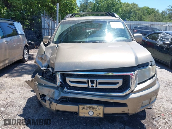 2011 Honda Ridgeline RTL with VIN 5FPYK1F57BB452321, listed as a IAAI auction lot 42306915 with Not provided miles and . Bid and sale history available at DreamBid. Image 12.