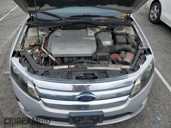 2010 Ford Fusion Hybrid z VIN 3FADP0L35AR110293, wystawiony jako Copart lot #43419065 z przebiegiem 163 946 mil mil oraz Szkoda całkowita • Salvage title. Historia ofert i sprzedaży dostępna na DreamBid. Obrazek 11.