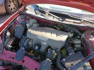 2004 Pontiac Grand Prix GT1 with VIN 2G2WP522741126274, listed as a IAAI auction lot 41439519 with 86,643 mi miles. Bid and sale history available at carsss.com. Image 10.