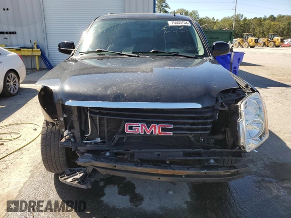 2011 GMC Yukon SLE with VIN 1GKS1AE02BR213992, listed as a Copart auction lot 75609704 with 133,536 mi miles and Salvage Title. Bid and sale history available at carsss.com. Image 5.