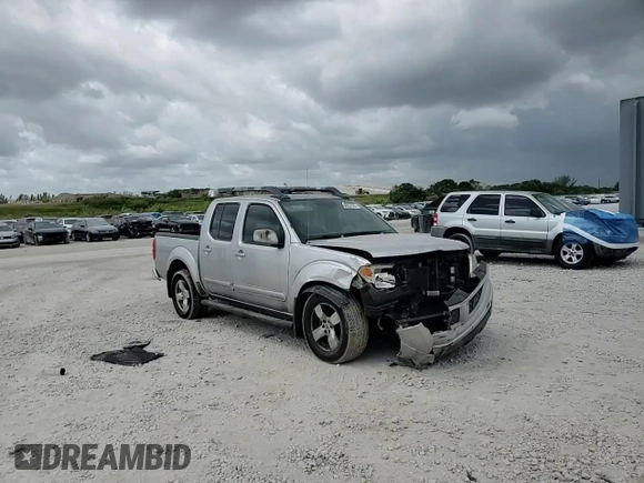 2005 Nissan Frontier LE with VIN 1N6AD07U75C452872, listed as a Copart auction lot 54954555 with 230,702 mi miles and Salvage title. Bid and sale history available at DreamBid. Image 13.