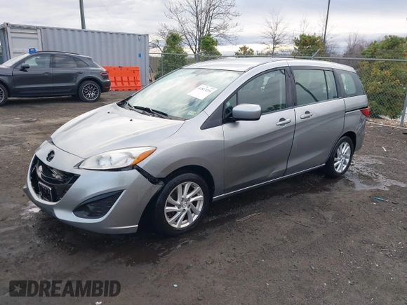2012 Mazda 5 Sport with VIN JM1CW2BLXC0107933, listed as a IAAI auction lot 41813231 with 164,395 mi miles and . Bid and sale history available at DreamBid. Image 2.