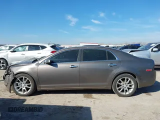 2012 Chevrolet Malibu LTZ with VIN 1G1ZG5E74CF133103, listed as a IAAI auction lot 41640075 with 173,692 mi miles and . Bid and sale history available at DreamBid. Image 14.