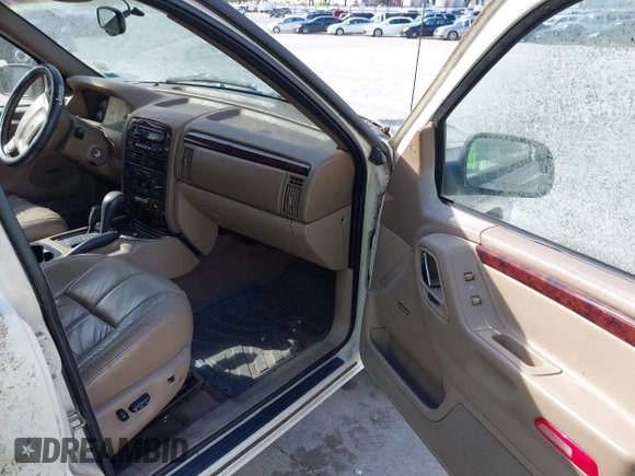 2001 Jeep Grand Cherokee Limited with VIN 1J4GW58NX1C545871, listed as a IAAI auction lot 42009766 with 191,570 mi miles and . Bid and sale history available at DreamBid. Image 5.