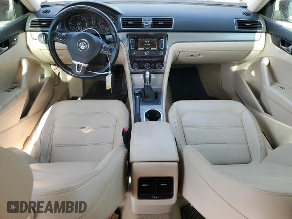 2014 Volkswagen Passat SE with VIN 1VWBN7A32EC088774, listed as a Copart auction lot 60753755 with 124,660 mi miles and Salvage title. Bid and sale history available at DreamBid. Image 8.