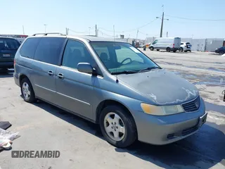 2001 Honda Odyssey EX z VIN 2HKRL18641H504729, wystawiony jako IAAI lot #42337944 z przebiegiem 203 356 mil mil oraz . Historia ofert i sprzedaży dostępna na DreamBid. Obrazek 1.