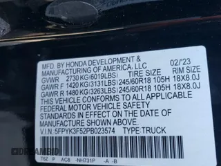 2023 Honda Ridgeline RTL with VIN 5FPYK3F52PB023574, listed as a Copart auction lot 44419565 with 15,205 mi miles and Salvage title. Bid and sale history available at DreamBid. Image 14.