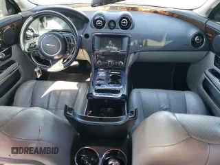 2012 Jaguar XJ with VIN SAJWA1CB7CLV33879, listed as a Copart auction lot 88708995 with Not provided miles and Salvage title. Bid and sale history available at DreamBid. Image 8.