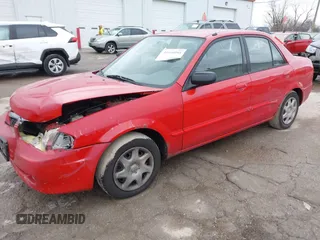 2000 Mazda Protege DX with VIN JM1BJ2224Y0277889, listed as a IAAI auction lot 41160593 with 124,586 mi miles and . Bid and sale history available at DreamBid. Image 17.