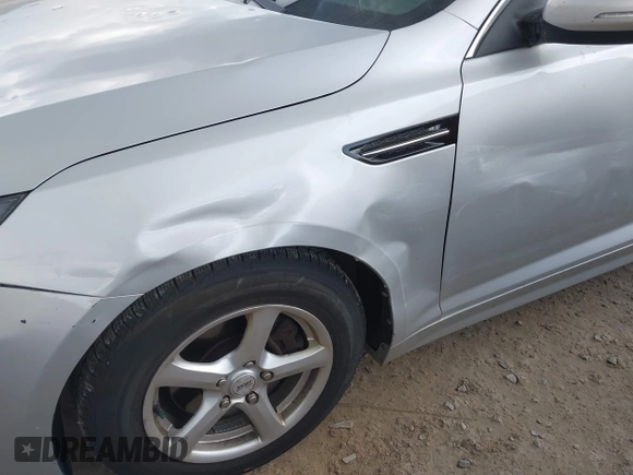 2014 Kia Optima LX with VIN 5XXGM4A71EG337837, listed as a IAAI auction lot 42251696 with 115,063 mi miles and . Bid and sale history available at DreamBid. Image 13.