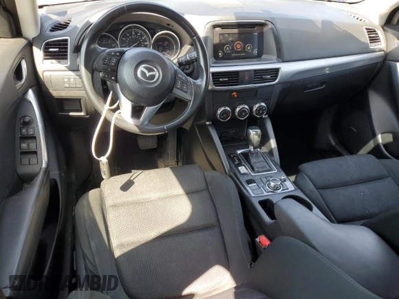 2016 Mazda CX-5 Touring with VIN JM3KE2CY2G0612029, listed as a Copart auction lot 53810155 with 159,915 mi miles and Salvage Title. Bid and sale history available at DreamBid. Image 8.