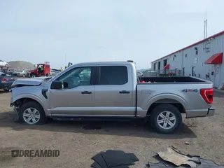 2021 Ford F-150 XL z VIN 1FTFW1E5XMFA28555, wystawiony jako IAAI lot #41814344 z przebiegiem 31 680 mil mil oraz . Historia ofert i sprzedaży dostępna na DreamBid. Obrazek 14.